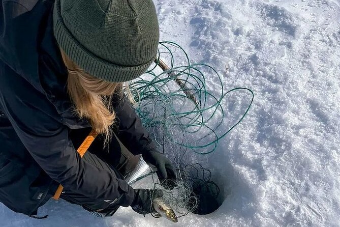 Arctic Fishing & Open Fire Cooking - Getting geared up for the cold: boots and overalls