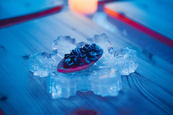 Arctic Snow Castle Visit with Lappish Dinner - Small Group Tour - Touring the ice hotel: 5-degree rooms and handmade carvings