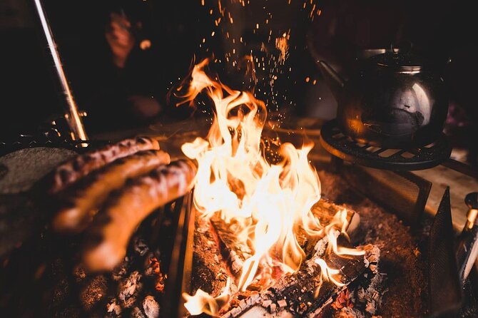 Aurora Arctic Ice Floating in Rovaniemi, Small-group - Warm Up Fast: Campfire Drinks and the Heated Cabin Moment