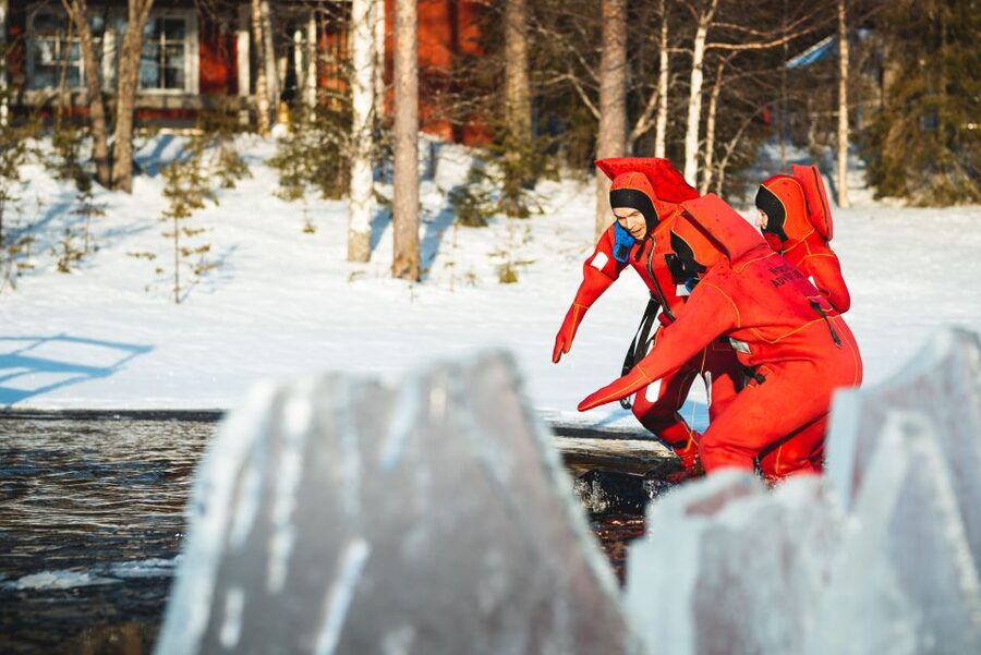 Daytime Ice Floating Rovaniemi, Frozen Lake Experience - After the Water: Open Fire, Cookies, and Hot Drinks