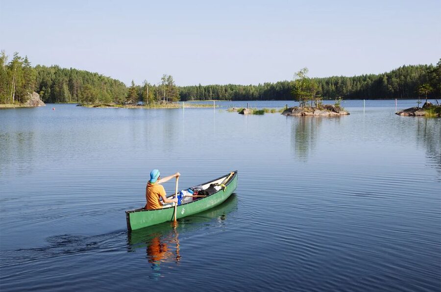 Lapland: Canoeing Trip with Reindeer and Husky Farm Tour - A Lapland day built around animals, then calm water