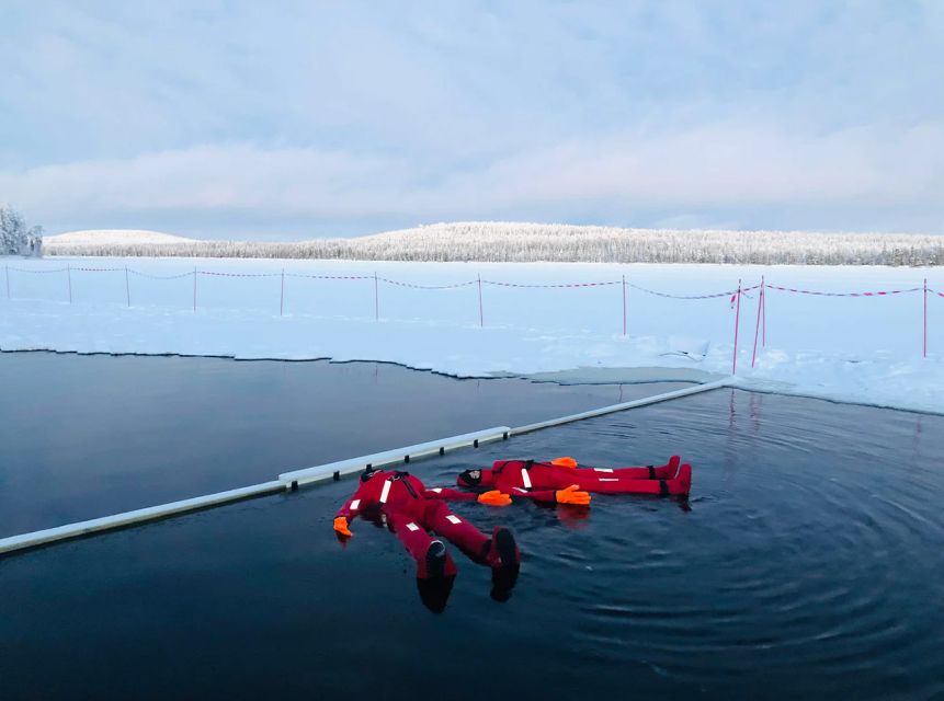 Lapland: Ice Fishing, Floating & BBQ Snow Adventure - The BBQ break on the ice: grilled salmon, marshmallow, and warm drinks
