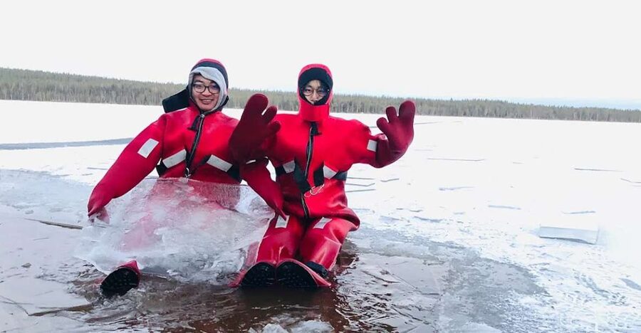 Lapland: Ice Fishing, Floating & BBQ Snow Adventure - Ice fishing lesson: drilling a hole and actually using the gear