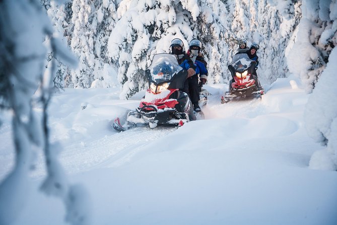 Lappish Lunch Break -Snowmobiling, ice fishing and tasty food - Who This Snowmobile and Ice-Fishing Lunch Break Fits Best