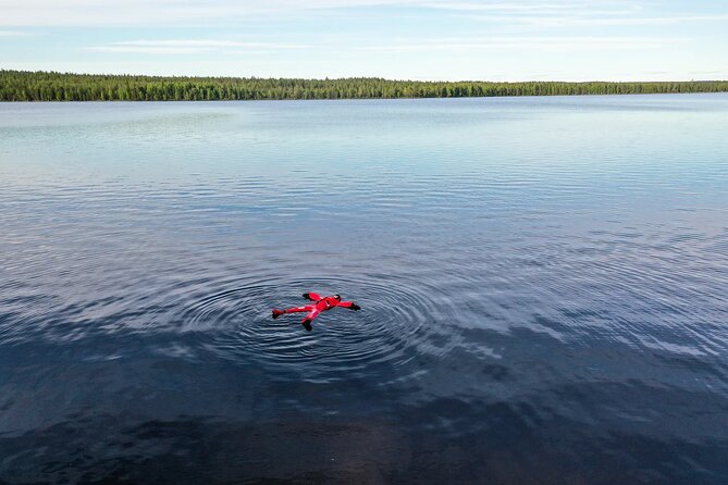 Midnight Sun Floating Experience in Forest Lake - Suit up, get guided, then float
