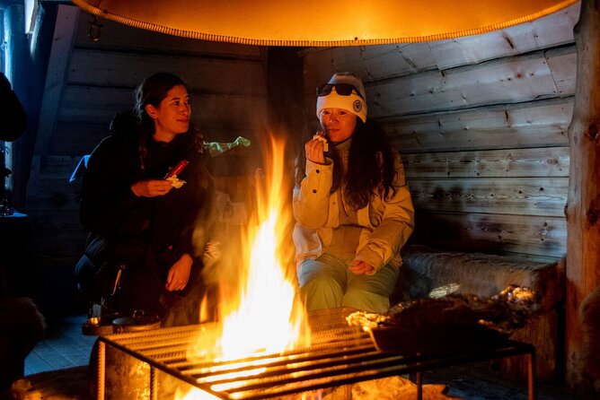 Northern Lights Hunt from Rovaniemi with Folk Tales and Snacks over Campfire - The campfire segment: folk tales, berry juice, and fire-cooked comfort