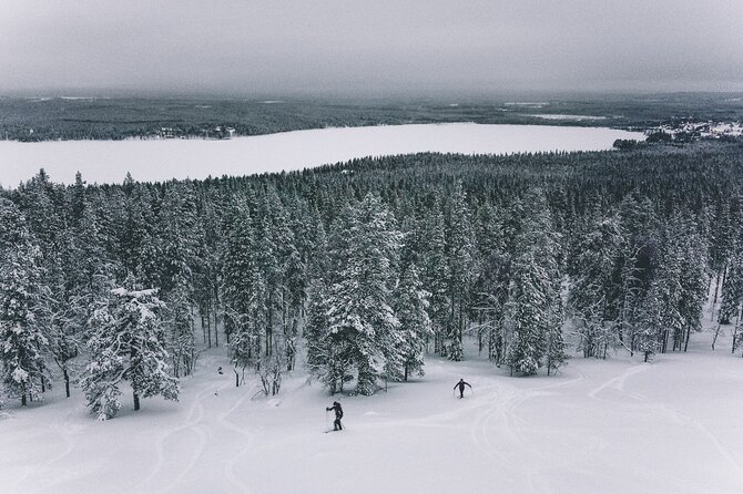 Private Northern Lights Tour With Skis Or Snowshoes in Pyhä - Stop 3: Taste Of Outdoors campsite break with hot drinks and snacks