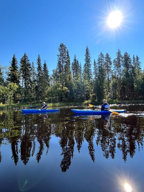Rovaniemi: Guided Wilderness Kayaking Adventure - Paddling on a calm Lapland lake: what it feels like