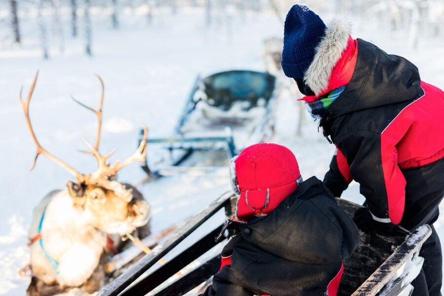 Rovaniemi: Husky & Reindeer Experience with Snowmobile Ride - Santa Claus Village time: fun photos, tourist energy, and a useful landing