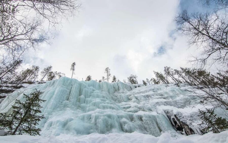 Rovaniemi: Korouoma Canyon and Frozen Waterfalls Tour - The guided hike: cliffs, rapids, and frozen waterfall sights