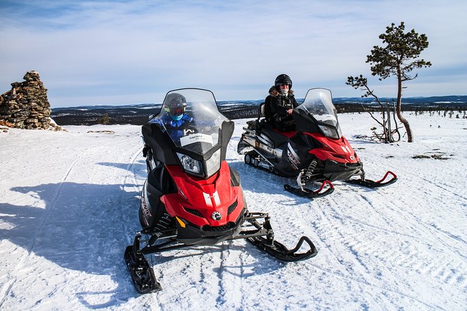 Snowmobile Safari in the Forest - Lunch by open fire: warming up the right way