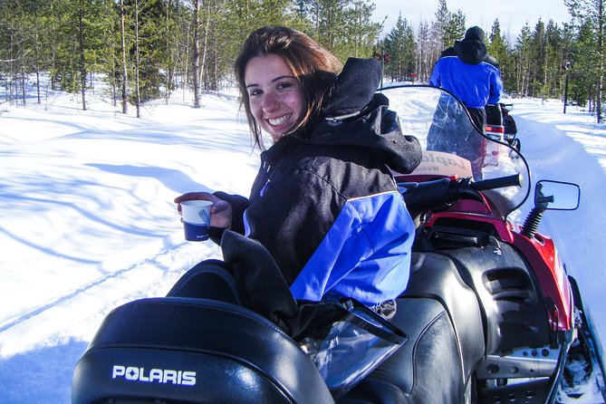 Snowmobile Safari in the Nature - Morning start - Warming drinks, snacks, and a tipi-style break that can feel like more than a pause