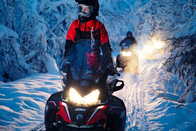 Snowmobile Tour with Small Group in Remote Wilderness 3 Hours - Kids and Families: Covered Sled Riding Behind the Guide