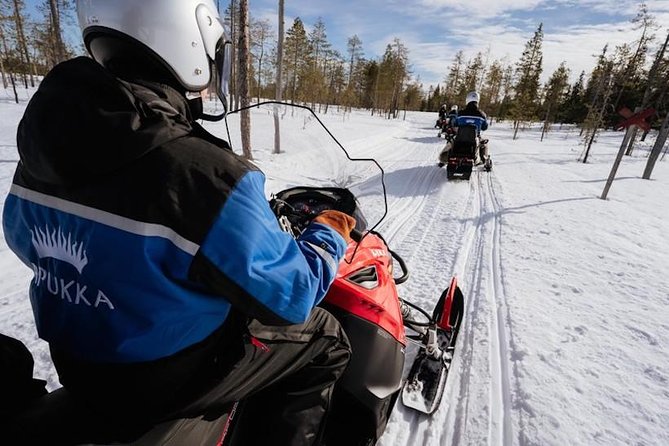 Snowmobiling and ice fishing in Apukka Resort, Rovaniemi - Why Apukka’s snowmobile and ice fishing combo is such a solid Lapland day