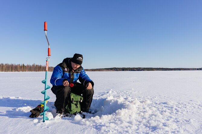 Snowmobiling and ice fishing in Apukka Resort, Rovaniemi - Heading to the frozen pond: the ride becomes part of the story