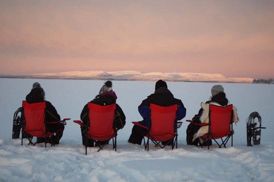 Snowshoe experience with traditional beverages in Lapland - What Makes Lapland Snowshoeing With a Fire-Picnic Work